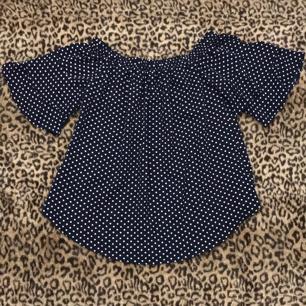 Off the shoulder blouse .